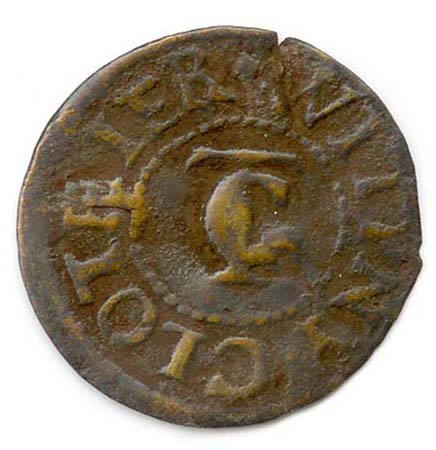 A copper farthing token of Thomas Collier, 1650s-1660s. The reverse siude with the monogram 'TC'; there is a fleece in the centre of the other side.